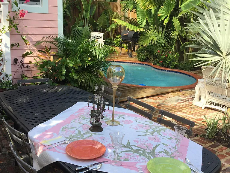 The back yard and view of Guest Cottage.