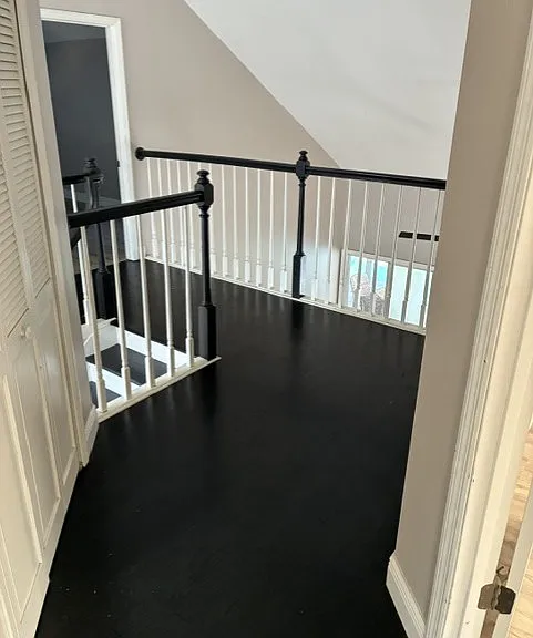 Upstairs hall overlooks family room and entrance
