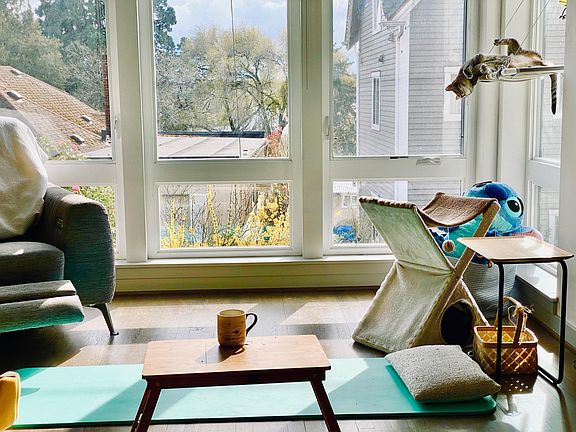Living room corner with view for Green Lake for reference.