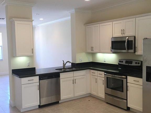5th image of 8340 Cocoplum Sound Ln