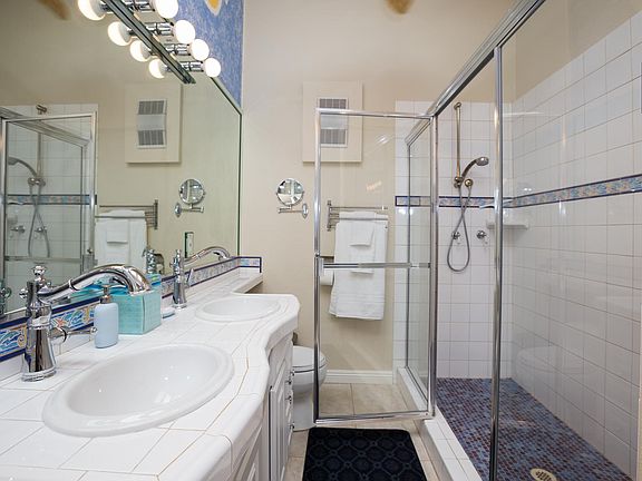 Master Bath, Long Tiled Shower, 2 Showers, 2 basins, Ceiling Fan