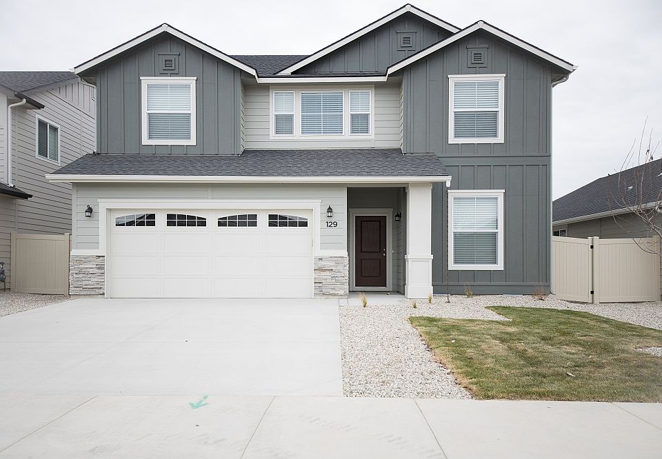 129 S Iceberg Lake Ave Merdian. 2 story home with a 2 car garage.