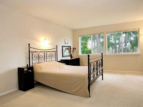 Master bedroom with lots space and large windows!