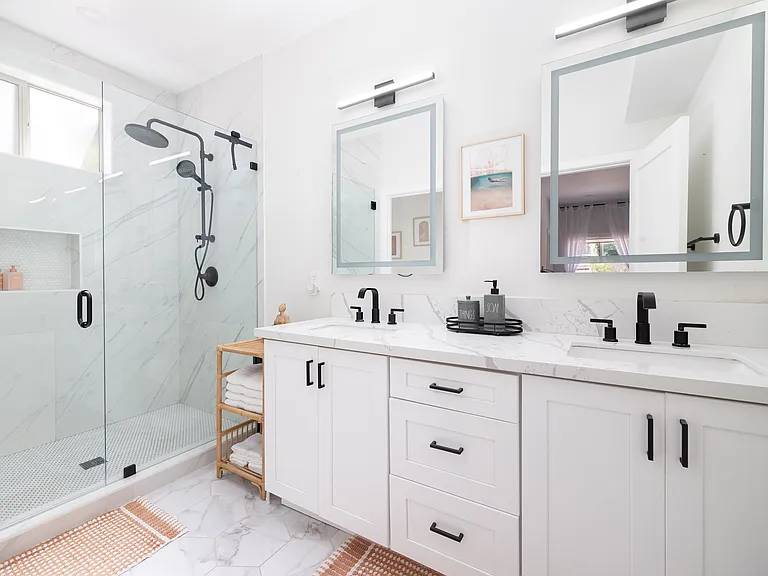 Dual vanity sinks/Large walk-in shower/LED lighted mirrors.