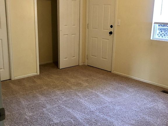 Upstairs, 1st bedroom with backyard access