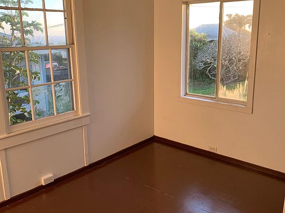 Bedroom 1 has peek-a-boo ocean view.