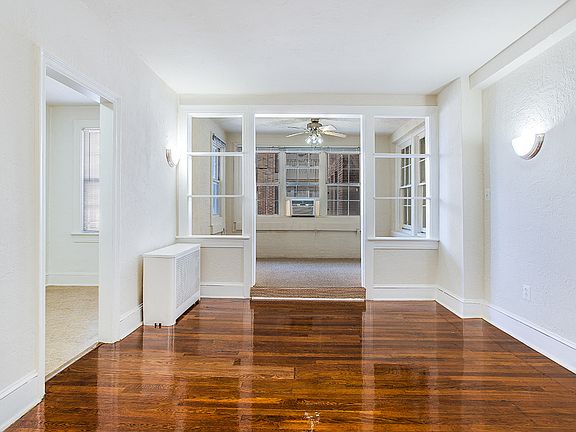 Living and sunroom (virtually staged)