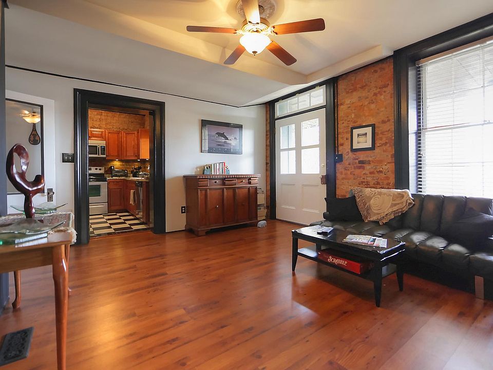 Den with Access to Kitchen and Deck