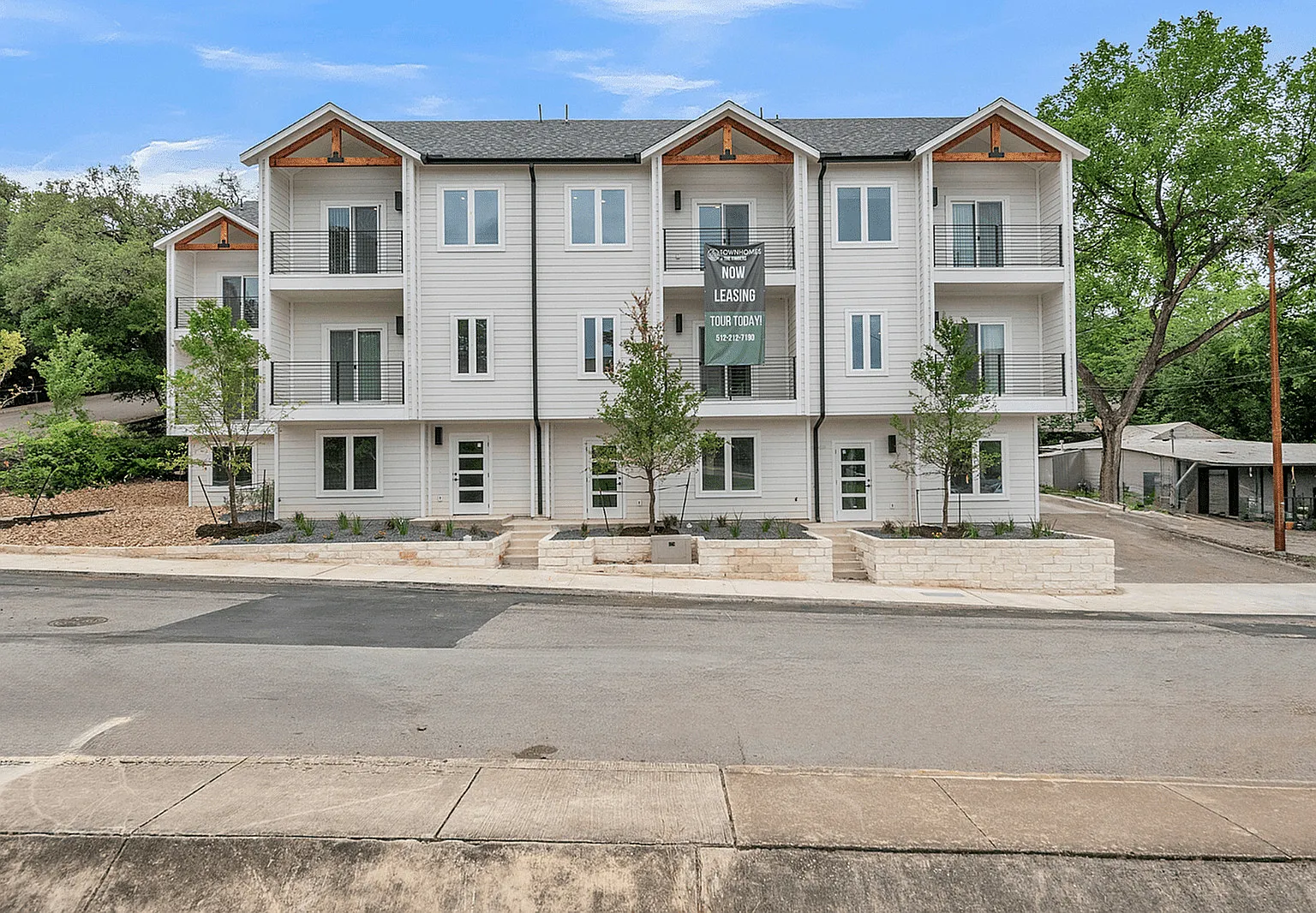 The Townhomes at The Timbers — Photo 1