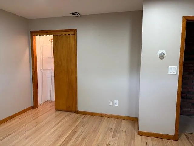 Primary BR with walk in closet with shelving and lighting. Thermostat regulated.
