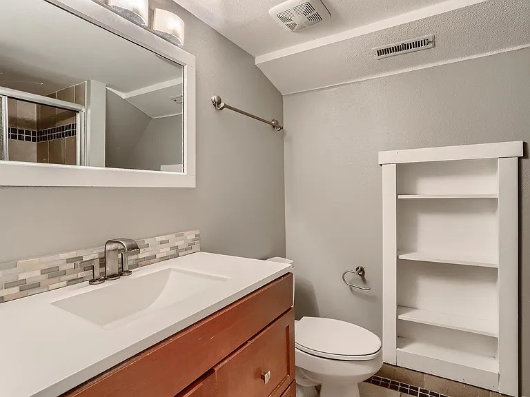 Bathroom next to Bedroom 5 on the lower level.