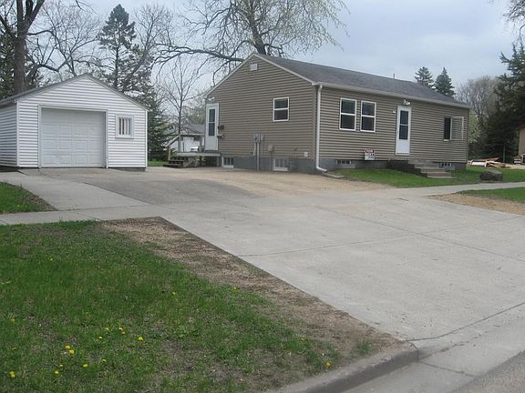 Street View of Home, Garage, & Off-street, mostly concrete Parking
