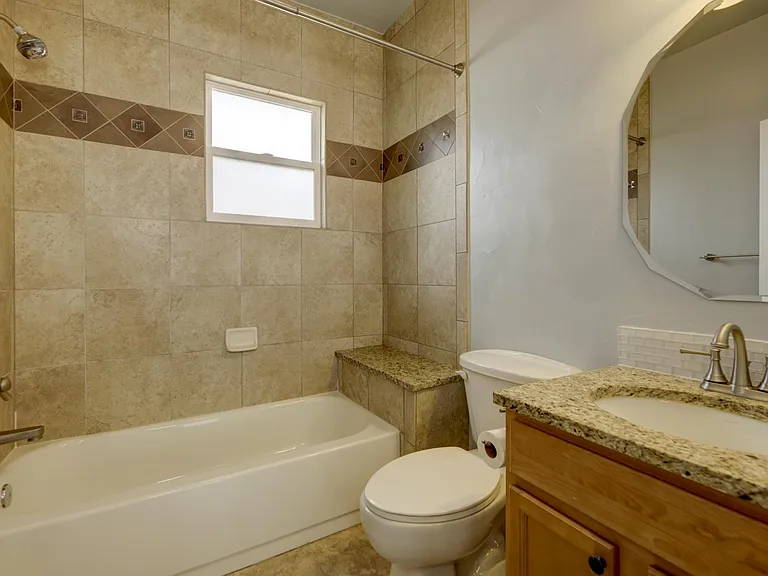 2nd full detached bath located in hallway between the 2 main floor bedrooms.