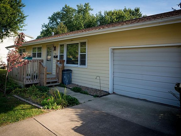 Front porch with handrail and plenty of space for your flowe