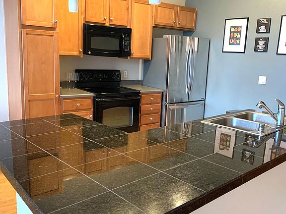 Kitchen with updated appliances and plenty of storage