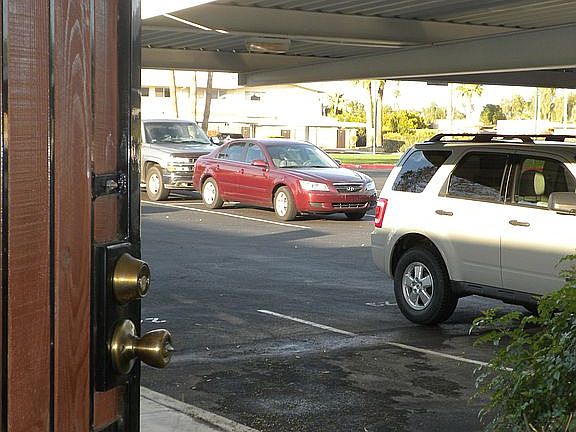 Covered parking spot right outside your door.