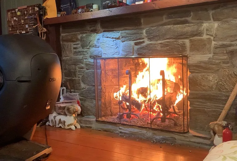 Close-up of Family Rm fireplace and massage chair