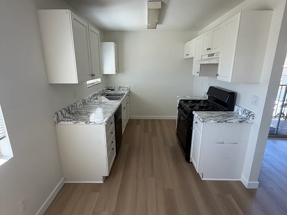 Kitchen, New flooring and Paint.