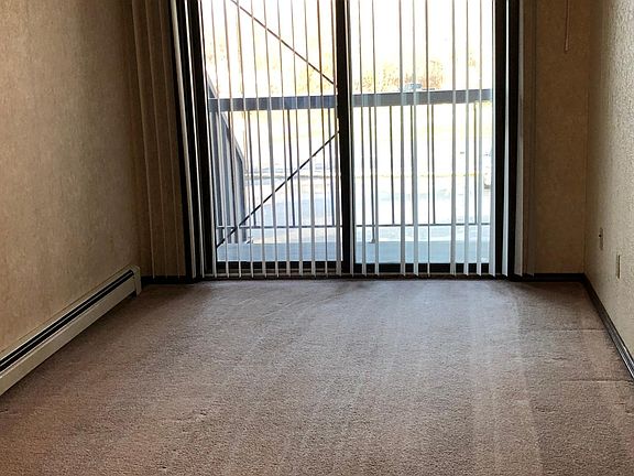 Living Room w/ Private Balcony