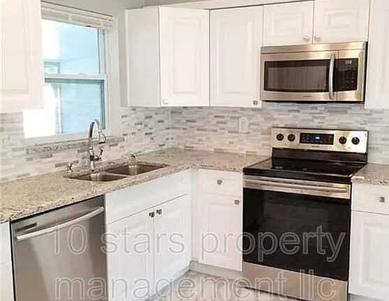 4th image of 6271 66th Ave N