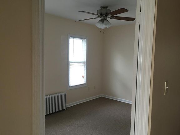 Second bedroom with ceiling fan
