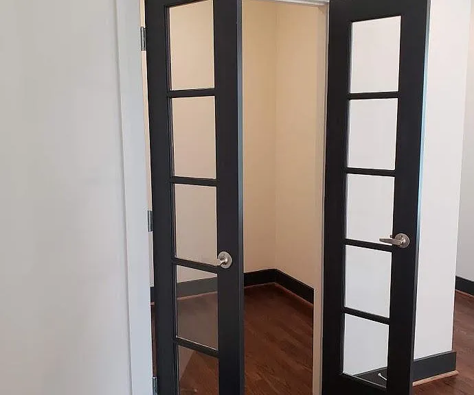 French doors leading into upstairs office.