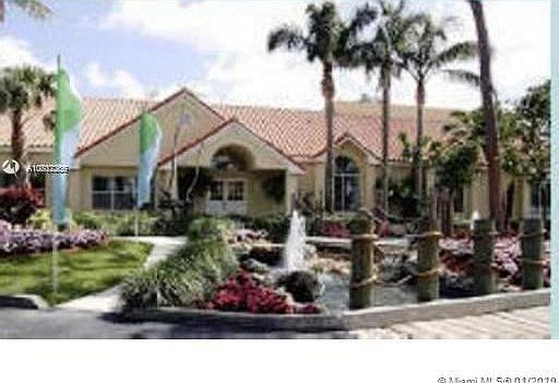 1st image of 3460 Pinewalk Dr N APT 312