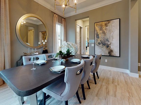 The flex room offers an elegant design that adds privacy while seamlessly flowing to the kitchen. A