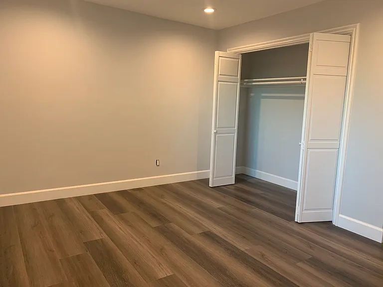 Large downstairs bedroom or office with closet / storage
