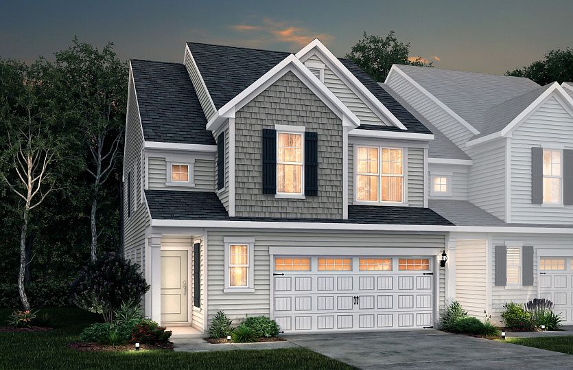 Palomino Exterior 1 features siding, shakes, covered front door and 2-car front load garage