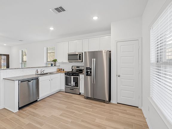 Gorgeous kitchen with all stainless appliances