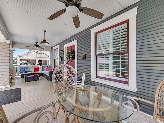 The gracious front porch is the perfect spot to have a cup of coffee in the morning or an cool drink in the afternoon.