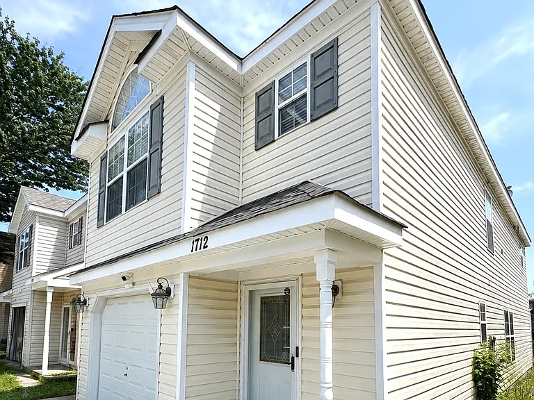 Front exterior with front porch