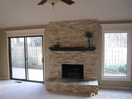 New stone facade on fireplace