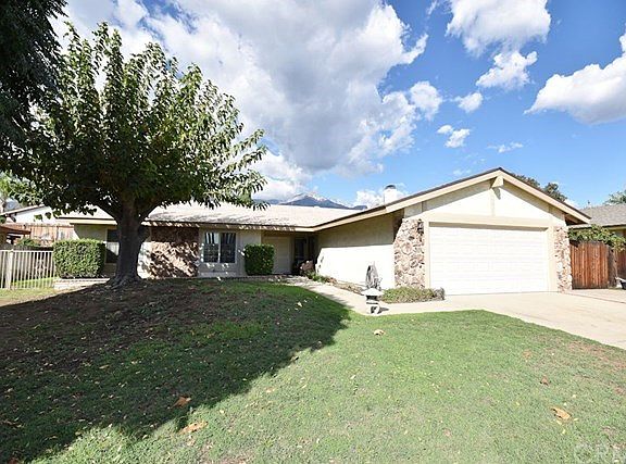 Large lot with mature trees adds extra shade