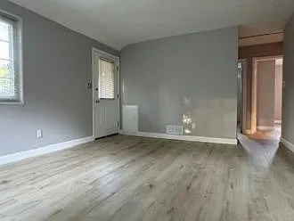 Entrance into living room and side of the rooms