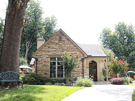 The exterior stone was brought from an Arkansas quarry and adds a distinctive "cottage look" to the home.