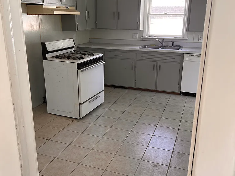 kitchen- new stove and fridge are being installed