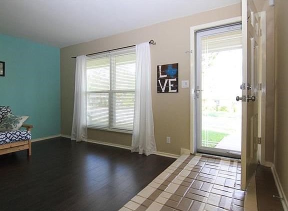 Fabulous entrance!  Use your storm door and let the sunshine in, without sacrificing security.  The updated color scheme is sure to go with any decor.