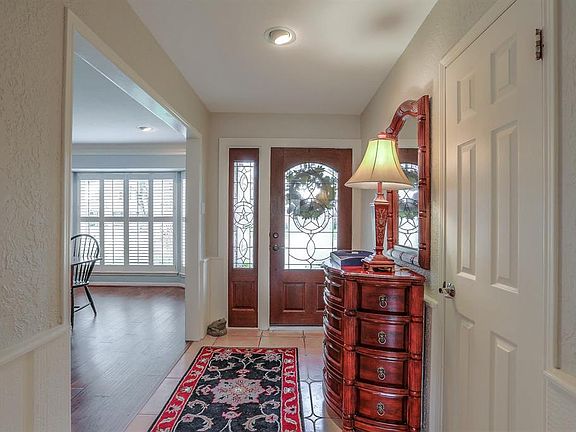 Come through the beautiful door to the welcoming entry. This home has wonderful flow.