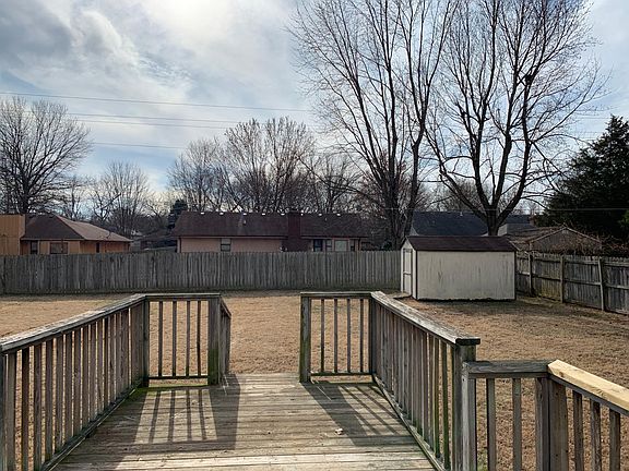 Back porch, yard, and shed