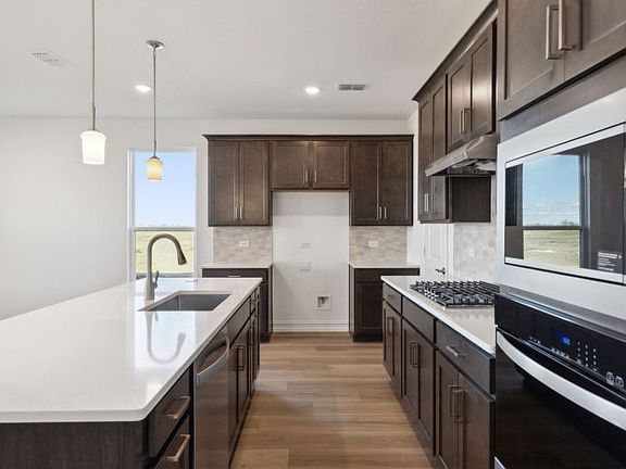 Spacious kitchen with ample cabinet space real home pictured