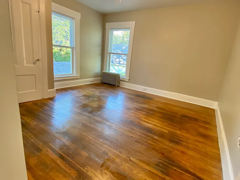 Rear bedroom off kitchen with closet.
