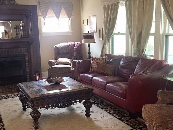 Large Living room with Victorian fireplace