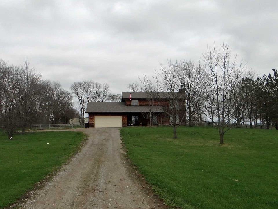 5 acres,5 car garages & barn