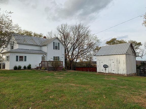 South side of Home with Work Building
