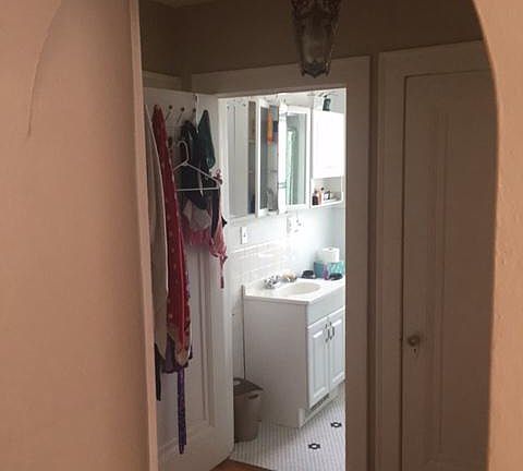 Bathroom. White and black tile.