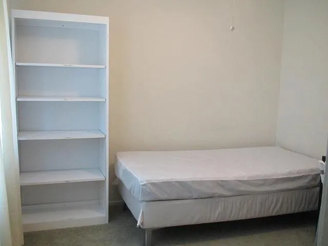 Bedroom 1: Twin bed with water proof bed cover