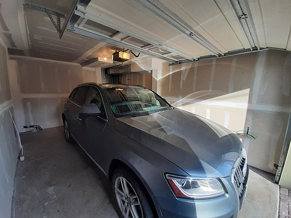 Plenty of space for Q5 SUV in the garage - storage underneath stairs (not seen in pic)