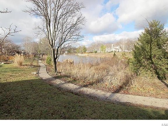 This is the view from the back of the house and access to the walking trail around the subdivision lake!